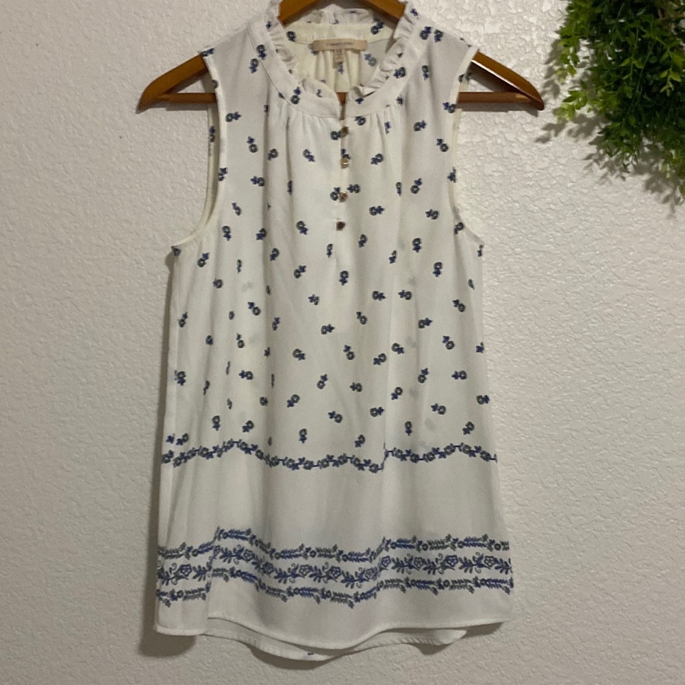 41 Hawthorn Ivory Sleeveless Top With Ruffle